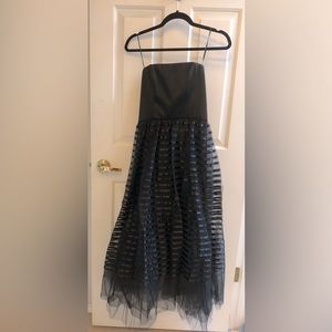 ABS strapless striped black cocktail dress with tulle fabric underneath.